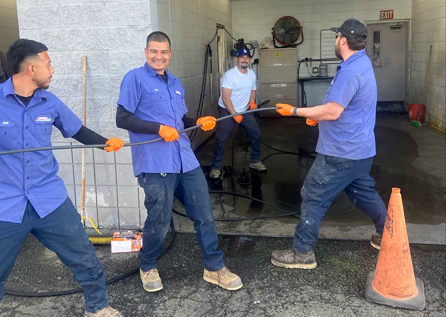 Commercial plumbers working together during a service call in Vacaville, CA