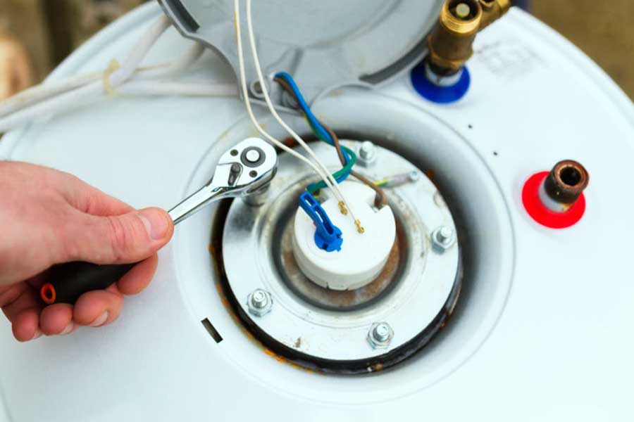 Commercial water heater undergoing professional repair and electrical service in Vacaville, CA