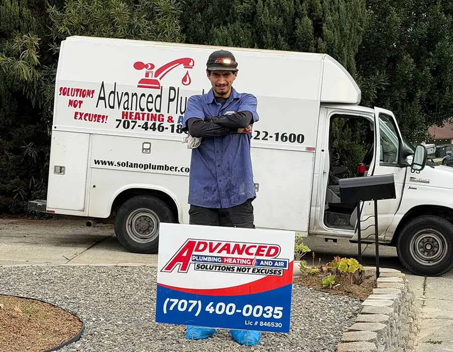 HVAC technician ready to complete an attic fan installation in Vacaville, CA