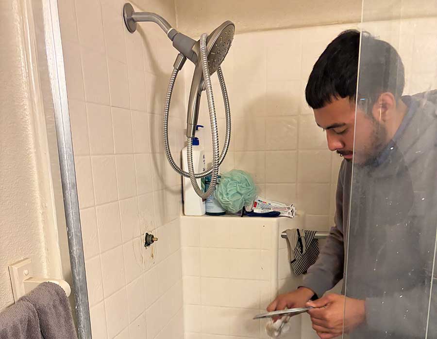 Technician replacing a shower valve in Vacaville, CA