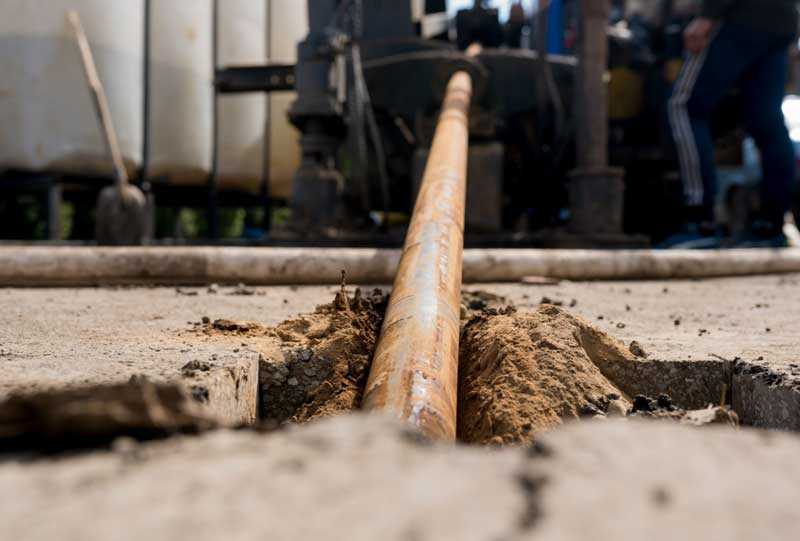 Exposed underground sewer pipe during sewer line replacement in Vacaville, CA
