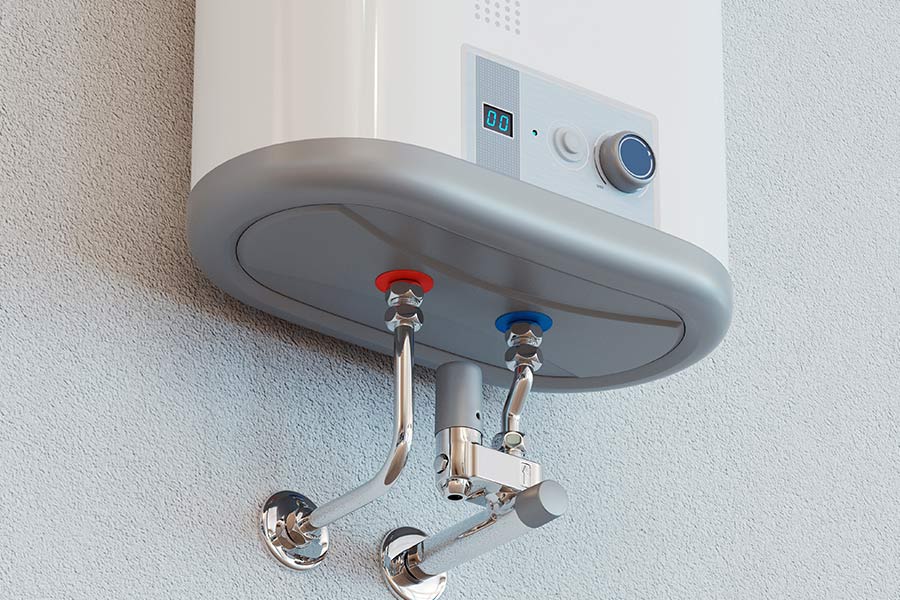 Commercial tankless water heater system with connected plumbing lines after completed repair