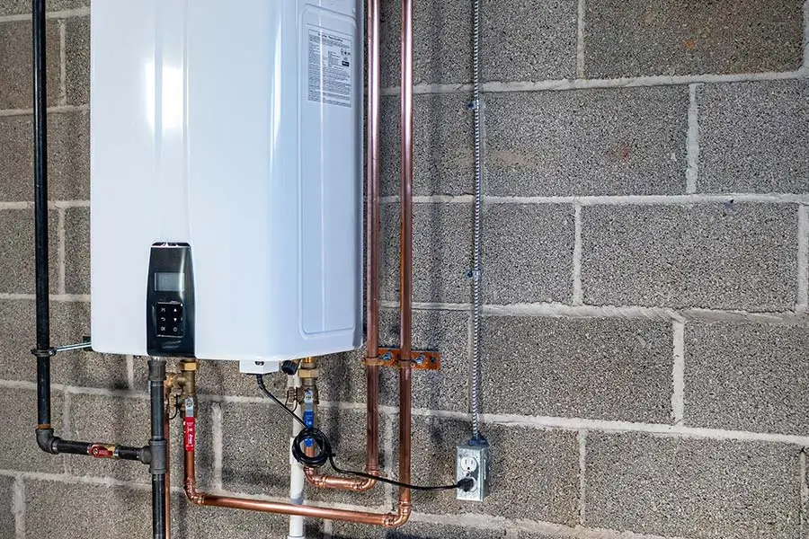 Commercial tankless water heater system inspected for repair in Vacaville CA
